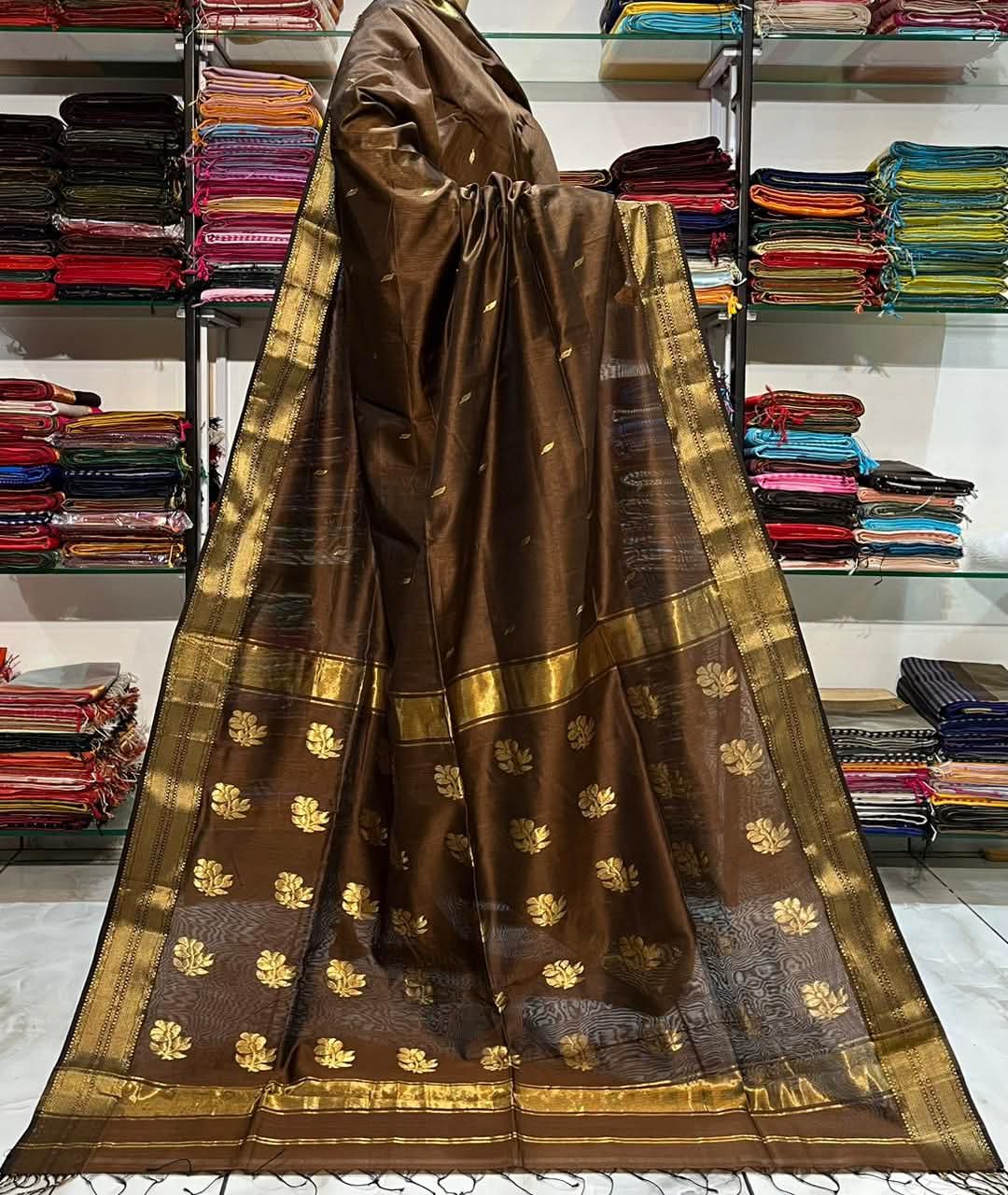 Light organza sarees with golden zari work and blouse piece. view 6